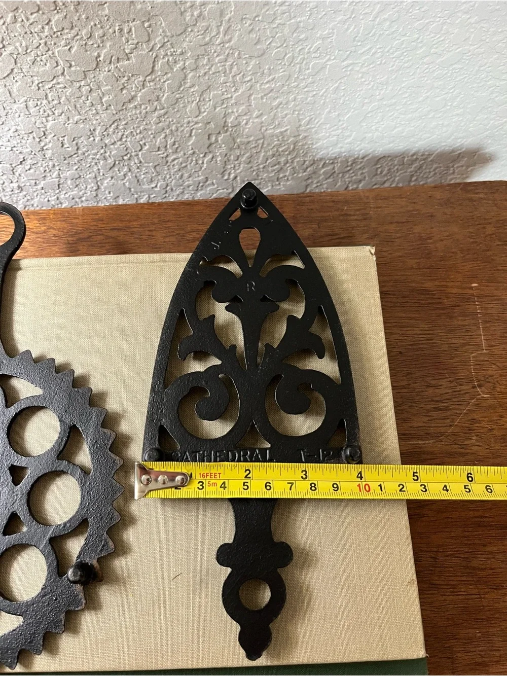 Set of 2 vintage cast iron trivets